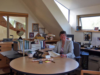 Linda Saunders, CFE, in her Quilcene office in Northwest Washington.